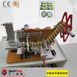 Semi - automatic top flat labeling machine